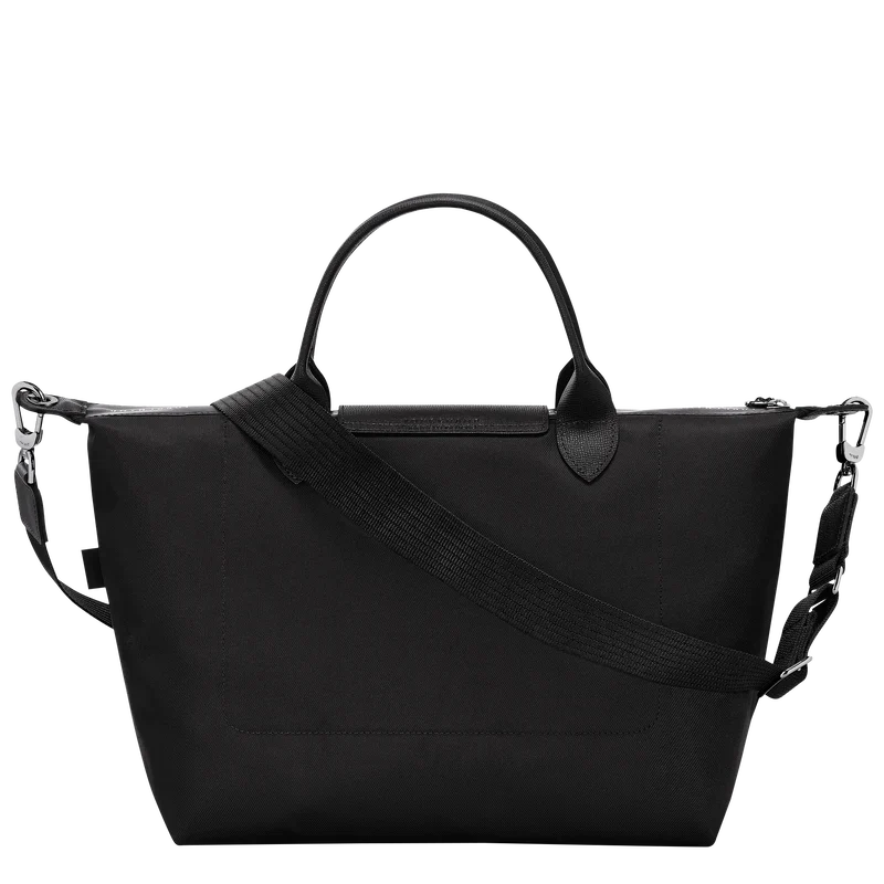Longchamp Le Pliage Energy L handbag in black, showcasing its structured design and durable fabric with leather handles.