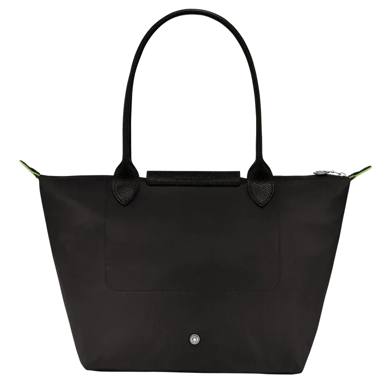 Longchamp Le Pliage Green M tote bag in black leather with foldable design and sturdy handles.