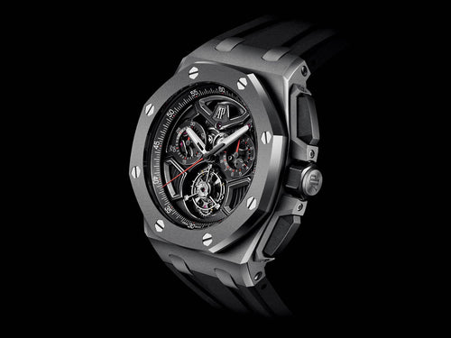 Audemars Piguet Royal Oak Offshore men's watch with titanium case, black dial, and sporty design.