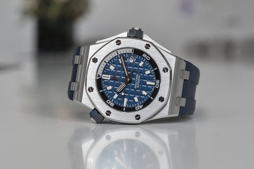 Audemars Piguet Royal Oak Offshore men's watch with stainless steel case, black dial, and sporty design.