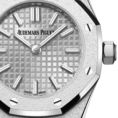 Audemars Piguet Royal Oak women's watch with a wine-colored dial and gold bracelet, showcasing luxury and elegance.