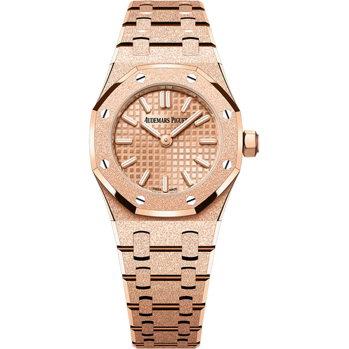 Audemars Piguet Royal Oak women's watch with gold case, elegant dial, and stainless steel bracelet.