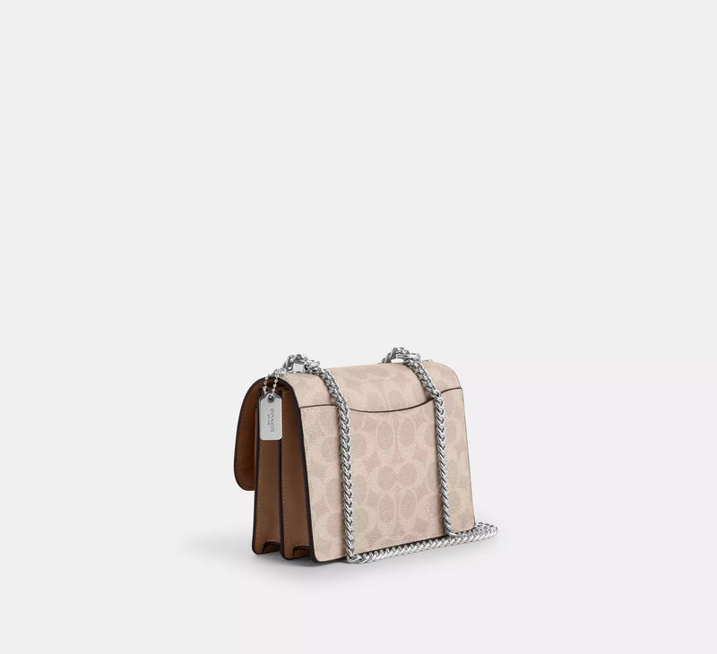 Coach Mini Klare Crossbody Bag In Signature Canvas Sand Taube