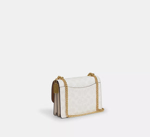 Coach Mini Klare Crossbody Bag In Signature Canvas White Chalk