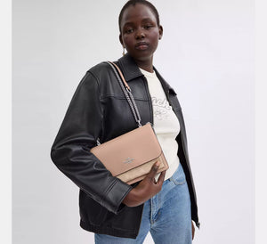 Coach Klare Crossbody Bag In Signature Canvas Sand Taube