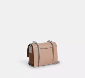 Coach Klare Crossbody Bag In Signature Canvas Sand Taube