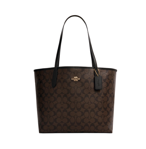 Coach City Tote Bag in signature canvas with brown and black design, featuring sturdy handles and spacious interior for everyday use.