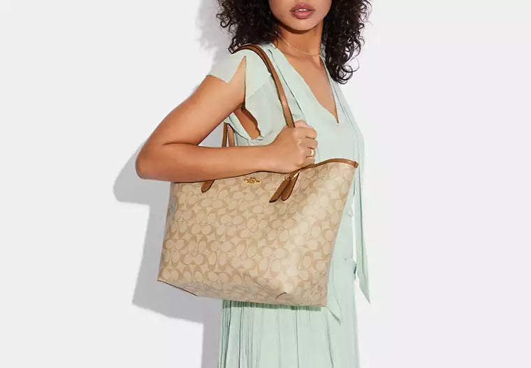 Coach City Tote Bag In Signature Canvas Lt Khaki Lt Saddle