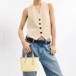Coach City Mini Tote Bag In Signature Canvas Yellow