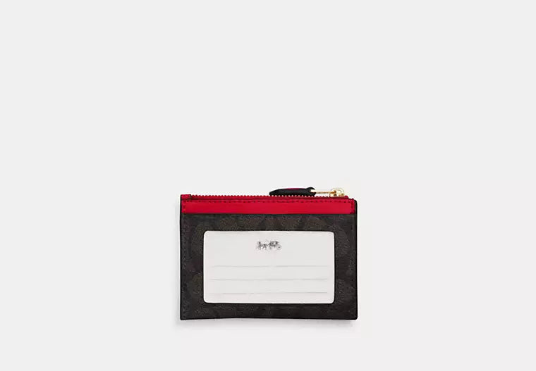 Mini Skinny Id Case In Signature Canvas