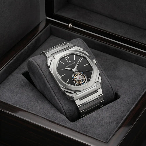 Bvlgari men's Octo watch with a black dial and tourbillon-style design, showcasing a sleek and luxurious timepiece.