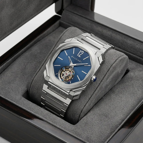 Bvlgari men's Octo watch with blue dial, tourbillon-style design, stainless steel case, and sophisticated luxury appearance.
