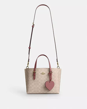 MOLLIE TOTE BAG 25 IN SIGNATURE CANVAS WITH HEART CHARM