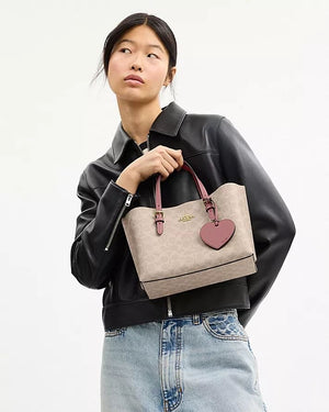 MOLLIE TOTE BAG 25 IN SIGNATURE CANVAS WITH HEART CHARM