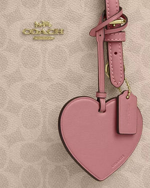 MOLLIE TOTE BAG 25 IN SIGNATURE CANVAS WITH HEART CHARM