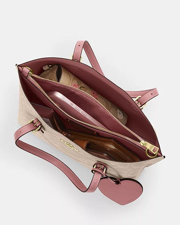 MOLLIE TOTE BAG 25 IN SIGNATURE CANVAS WITH HEART CHARM