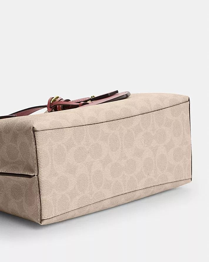 MOLLIE TOTE BAG 25 IN SIGNATURE CANVAS WITH HEART CHARM