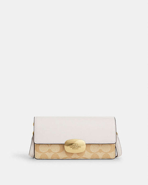 Eliza Small Flap Crossbody In Signature Canvas Coach