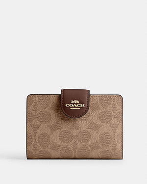 Coach Medium Corner Zip Wallet In Signature Canvas in tan brown