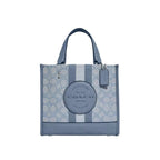 Light blue Coach Dempsey Tote bag in signature canvas with top handles and spacious interior, stylish and versatile for daily use.