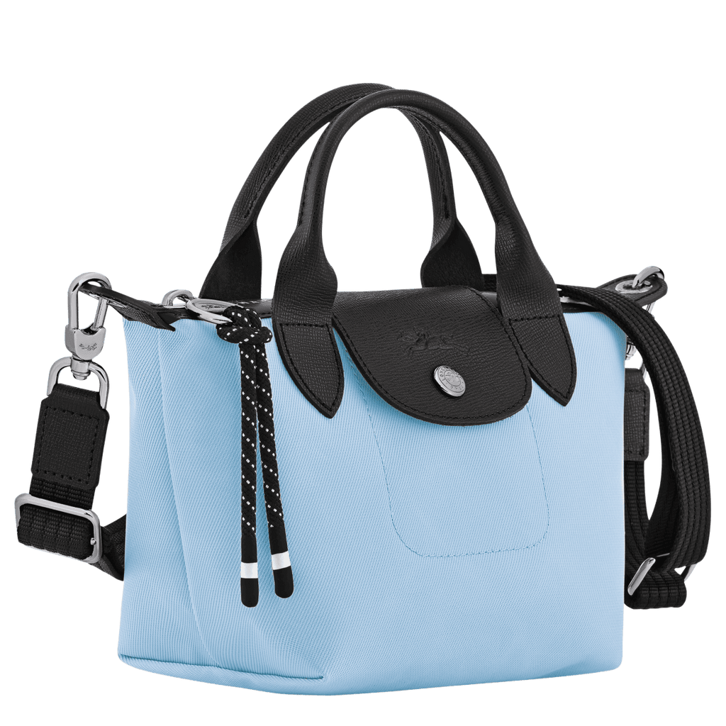 Longchamp Le Pliage Energy XS handbag in durable nylon with top handles and foldable design, shown in a sleek navy color.